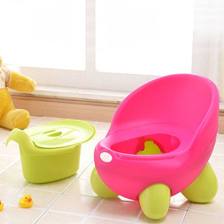 Toddler using Cartoon Baby Potty Training Toilet Seat safely
