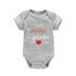 Unisex baby romper laid flat showing full design and stitching
