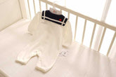Newborn baby wearing Navy Style Baby Onesie soft cotton fabric
