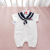 Navy Style Baby Onesie laid flat showing full design and stitching
