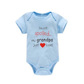 Short-Sleeve Cotton Baby Romper lifestyle image baby sleeping comfortably