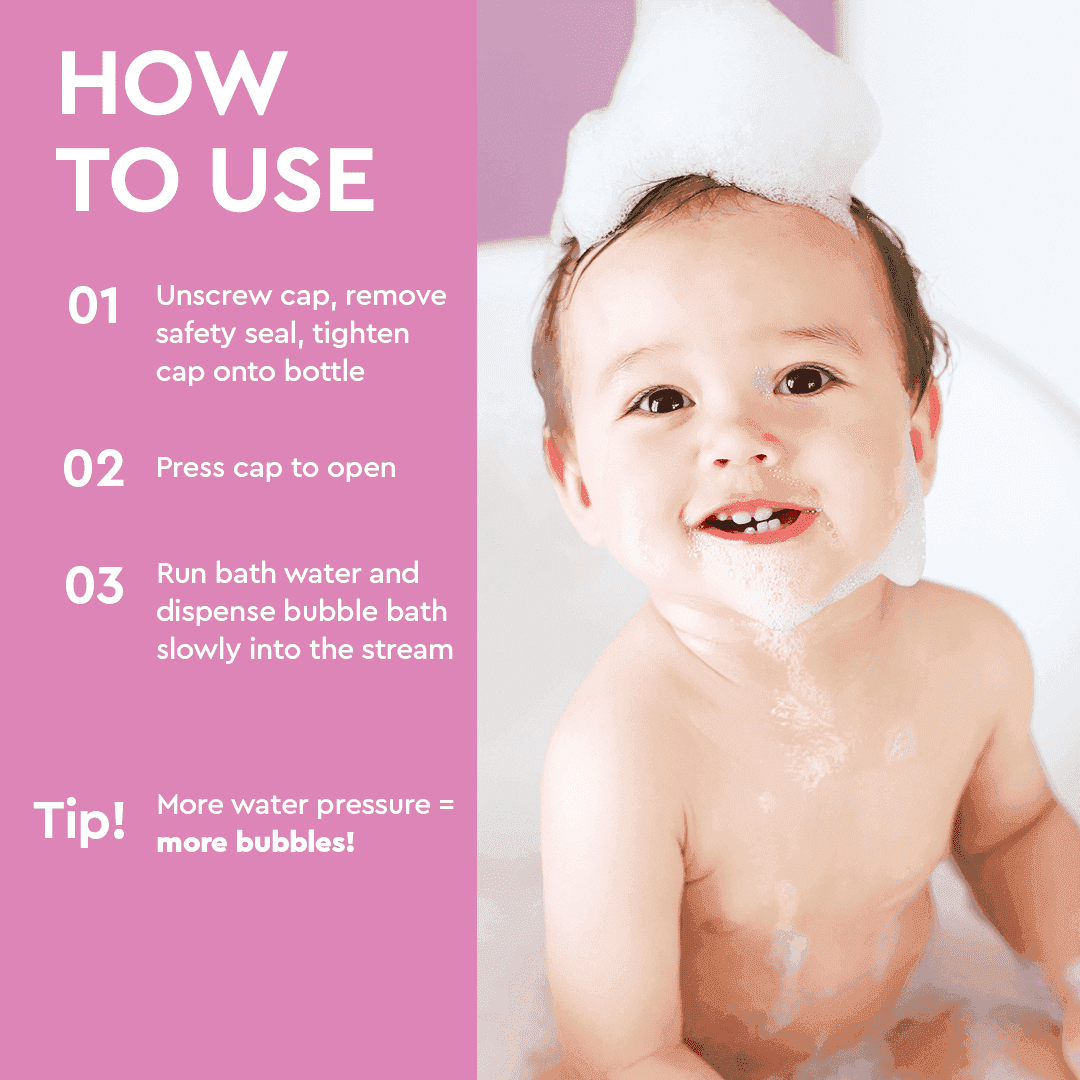 Baby with bath foam and cap demonstrating bubble bath usage